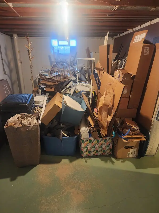 Roll-off dumpster container at job site for 4 Yard Dumpster Rental in Quincy